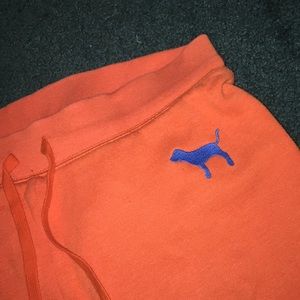 PINK orange sweatpants